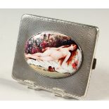 AN ENGINE TURNED SILVER CIGARETTE CASE, Birmingham 1926, with an oval of a reclining nude.