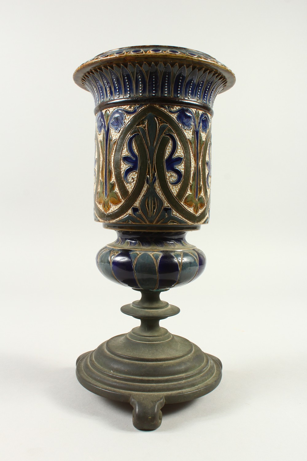 A DOULTON LAMBETH STONEWARE VASE, on a cast iron stand. 33cm high. - Image 4 of 8