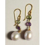 A PAIR OF 9CT GOLD, PERIDOT, AMETHYST AND PEARL SUFFRAGETTE EARRINGS.