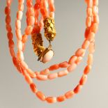 A CORAL NECKLACE.