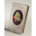 AN ENGINE TURNED SILVER CIGARETTE CASE, London 1938, with an oval of a nude with white robe.