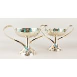 A GOOD PAIR OF WMF ART DECO TWO-HANDLED CIRCULAR TAZZAS, with blue enamel decoration. 19cms