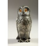 A CAST METAL OWL SHAPE PEPPERETTE. 9cms high.