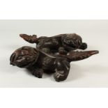 A PAIR OF CARVED WOOD FIGURES OF DOGS OF FO. 37cms long.