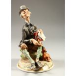 A GOOD CAPODIMONTE PORCELAIN GROUP, old man with a sausage dog at his feet. 25cm high.