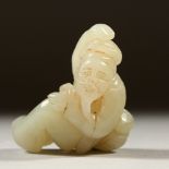 A SMALL WHITE JADE CARVING OF A SAGE. 6cms high.