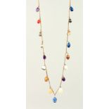 A CHAIN set with HARDSTONE EGGS.