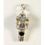 A SILVER NOVELTY DOGS HEAD WHISTLE.