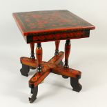 AN UNUSUAL PAINTED SQUARE SHAPE OCCASIONAL TABLE, with turned supports and an "X" shape stretcher.