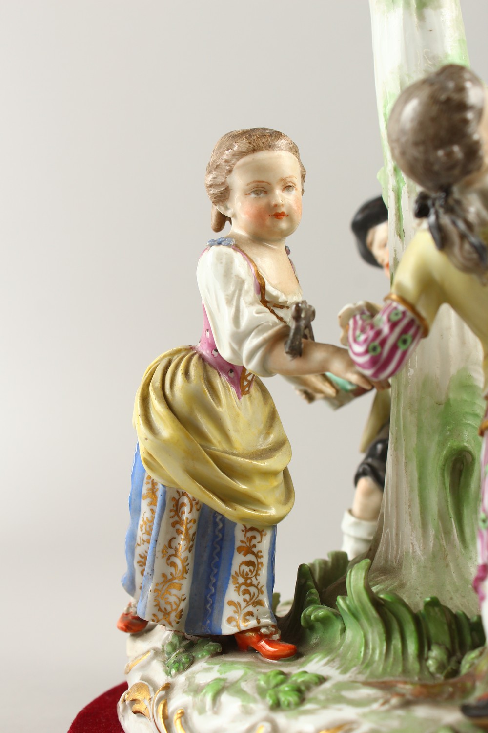 A 19TH CENTURY MEISSEN PATTERN GROUP, "RING-A-RING O' ROSES", four young figures dancing around a - Image 3 of 22