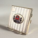 AN ENGINE TURNED SILVER CIGARETTE CASE, Chester 1927, with an oval of an old racing car.
