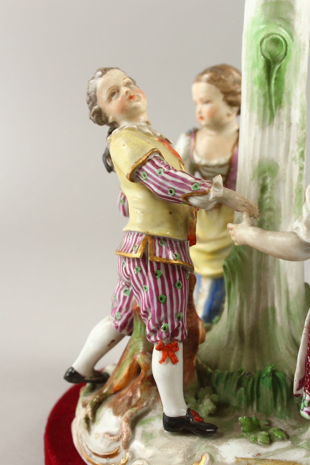 A 19TH CENTURY MEISSEN PATTERN GROUP, "RING-A-RING O' ROSES", four young figures dancing around a - Image 5 of 22