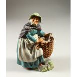 A ROYAL DOULTON FIGURE "OLD MEG", HN2492, designed by M. NICOLL, Issued 1974-1976. 21cms high.