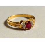 AN 18CT GOLD, RUBY AND DIAMOND RING.