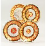 A SET OF FOUR VENETIAN GOLD AND RED PLATES with fruiting vines. 21cm diameter.