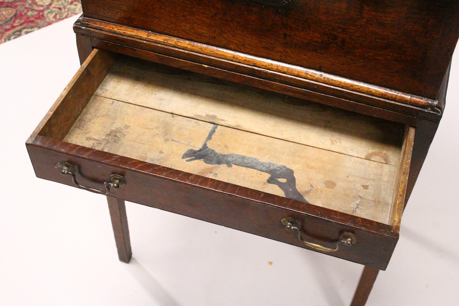 AN 19TH CENTURY OAK DESK ON STAND, with sloping front, fitted interior with small drawers, on a - Image 10 of 19
