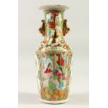 A 19TH CENTURY CHINESE CANTON PORCELAIN VASE, decorated with scenes of figures interior and floral