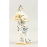 A SMALL MEISSEN PORCELAIN CLASSICAL FEMALE FIGURE HOLDING A GLOBE. Cross swords mark in blue. 9cms