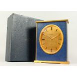 A JAEGER LECOULTRE MANTLE CLOCK, the gilt metal case with Lapis Lazuli panels, with its original
