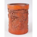 A LARGE CARVED BAMBOO BRUSH POT. 18cms high.