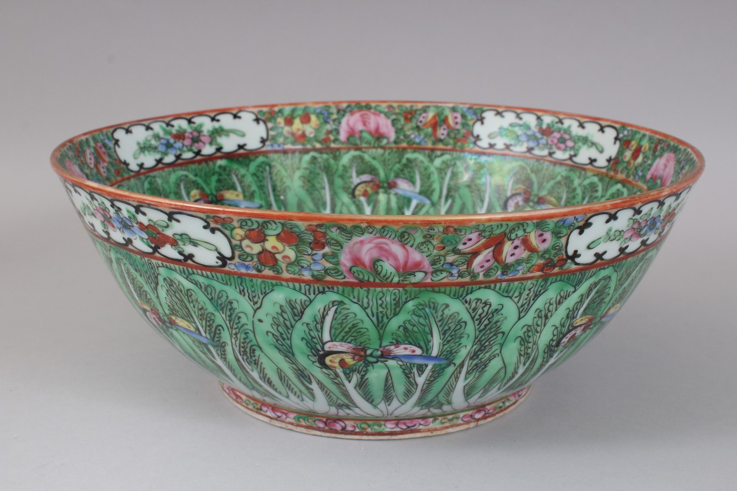 AN EARLY 20TH CENTURY CHINESE CANTON BUTTERFLY AND CABBAGE LEAF BOWL. 31cms diameter. - Image 3 of 7