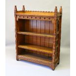A GOOD RARE AESTHETIC "PUGIN" DESIGN OAK OPEN BOOKCASE with two shelves. 106cms wide x 142cms high.