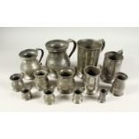 A BOX OF THIRTEEN PEWTER TANKARDS AND MEASURES, of various sizes.