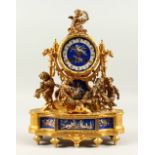 A 19TH CENTURY FRENCH GILT METAL AND PORCELAIN MANTLE CLOCK, mounted with cupids, the porcelain