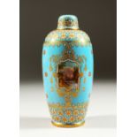 A GOOD COALPORT BLUE JEWELLERY JAR AND COVER, with gilt decoration and painted with a landscape
