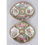 A GOOD PAIR CANTON CHINESE SHAPED OVAL DISHES, painted with panels of birds, flowers, butterflies