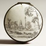 A BILSTON ENAMEL CIRCULAR BOX, the lid decorated with classical landscape. 6cms diameter.