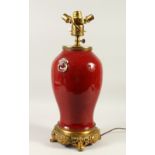 A 19TH CENTURY CHINESE OX BLOOD / FLAMBE TWIN LION DOG HANDLE PORCELAIN VASE AS A LAMP, with later