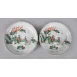 A GOOD PAIR OF 18TH-19TH CENTURY CHINESE FAMILLE CIRCULAR DISHES, painted with three figures and