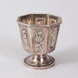 A TINY 19TH CENTURY CHINESE SILVER OCTAGONAL STEM CUP. 3.5cms.