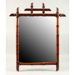 A GOOD ENGLISH 19TH CENTURY BAMBOO FRAMED MIRROR. 53cms high.