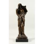 AN ART NOUVEAU STYLE BRONZE OF A STANDING FEMALE SEMI NUDE FIGURE. 44cms high.