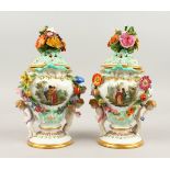 A SUPERB PAIR OF MEISSEN PORCELAIN FLOWER ENCRUSTED PIERCED URNS AND COVERS, painted with reverse