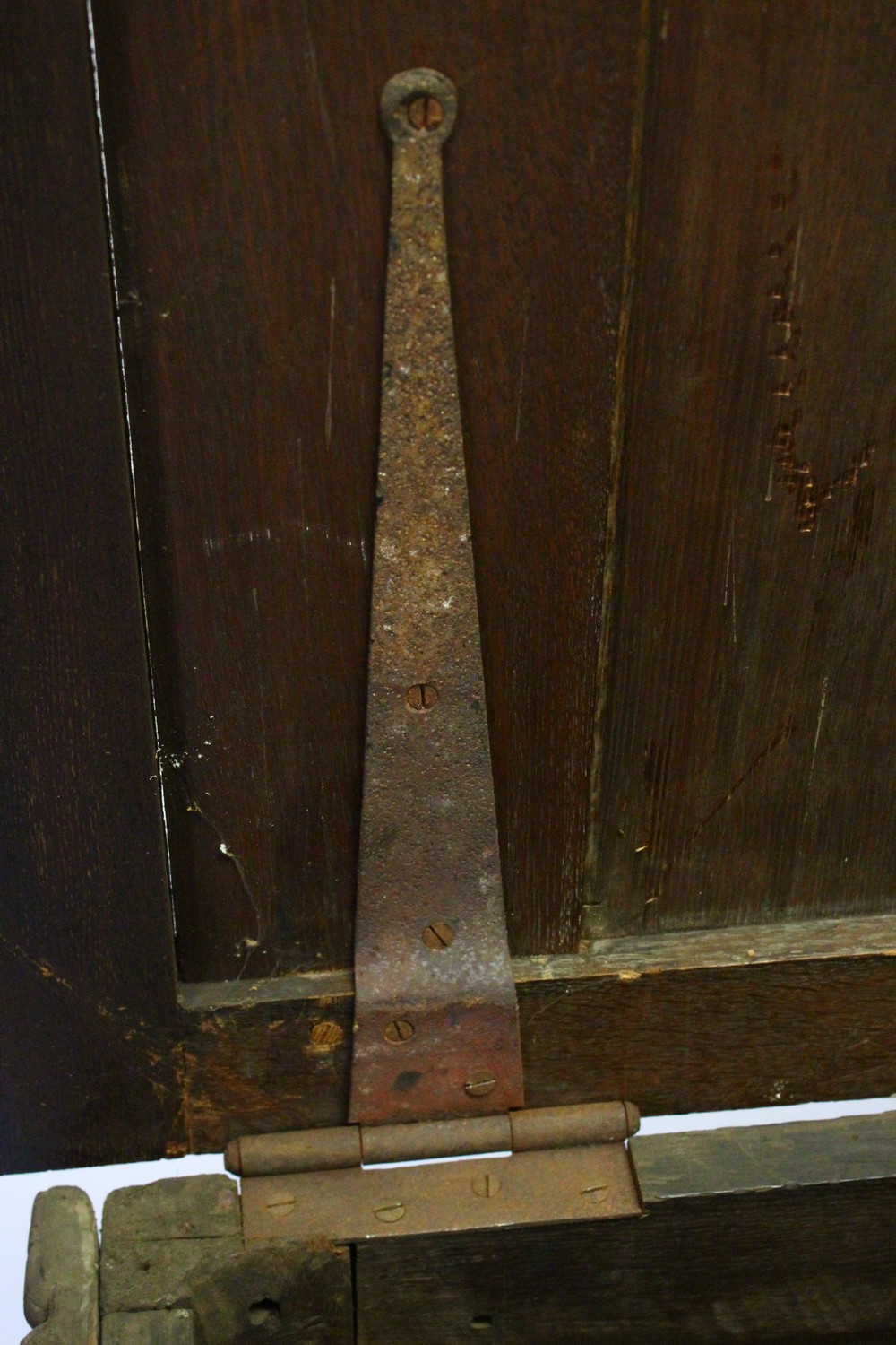 A LARGE 17TH-18TH CENTURY FRENCH OAK COFFER, with two plain panels to the top and two carved - Image 11 of 13