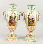 A PAIR OF AUGUSTUS REX TWO-HANDLED URN SHAPED VASES, painted with reverse panels of figures, on