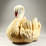 A LARGE POTTERY SWAN JARDINIERE. 46cms long.