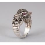 A RUBY SET SILVER "PANTHER" RING.