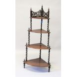 A VICTORIAN FOUR TIER MAHOGANY WHAT-NOT with barley twist supports. 136cms high.