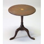 A MAHOGANY CIRCULAR TOP TRIPOD TABLE with circular inlaid motif.