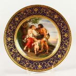 A VIENNA CIRCULAR PLATE "MELEAGER UND ATALANTA", within a blue and gold border. Inscribed. Beehive