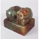 A CARVED JADEITE DOG OF FO SEAL. 8.5cms.