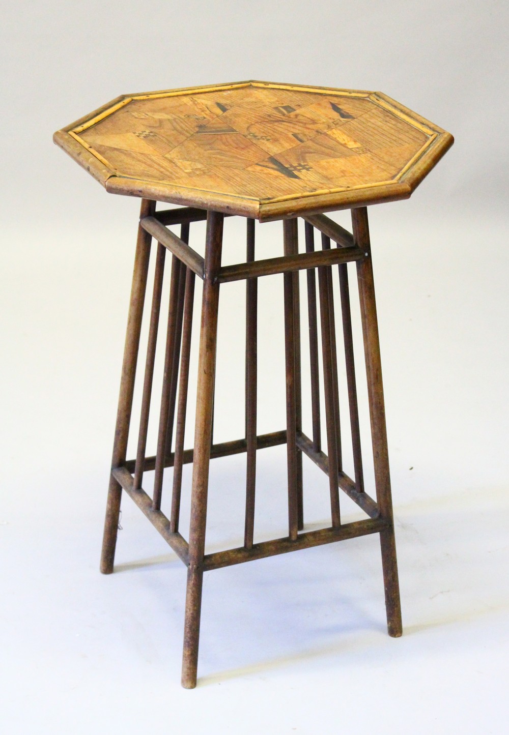 A 1920'S JAPANESE OCTAGONAL TOP BAMBOO TYPE TABLE. 49cms wide.