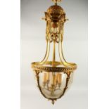 A GOOD FRENCH ORMOLU HANGING GLOBE, with five lights and scrolls. 90cms long.