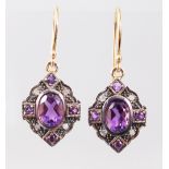 A PAIR OF 9CT GOLD AND SILVER SET AMETHYST AND DIAMOND DROP EARRINGS.