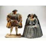 A RARE PAIR OF PAINTED LEAD FIGURES OF HENRY VIII and ELIZABETH I. 19cms high.