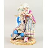 A 19TH CENTURY MEISSEN GROUP, of a young gallant holding a flower, a lady standing by his side, both